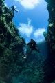 Divers in Silfra, Iceland. Melted glacierwater, many years of filtering through lavarock, resulting in the clearest water you have ever seen. 